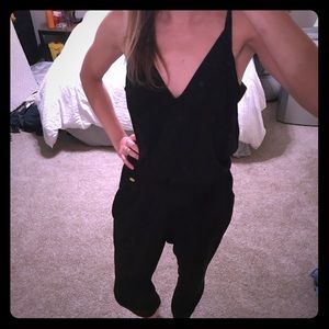 Black pant and spaghetti strap romper from Guess